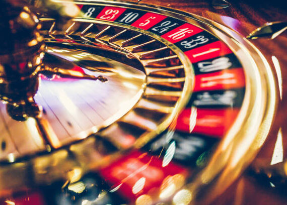 Spinning professional roulette wheel in casino. Property released.