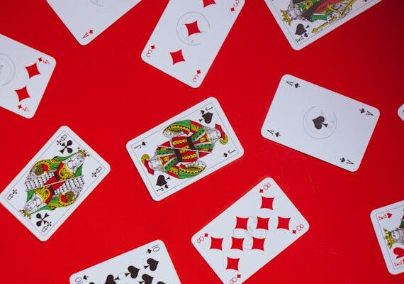 free-photo-of-photograph-of-playing-cards-on-a-red-surface