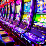 Line of electronic slot machines in casino. Property released.